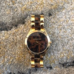 Michael Kors tortoise/gold watch with flat face